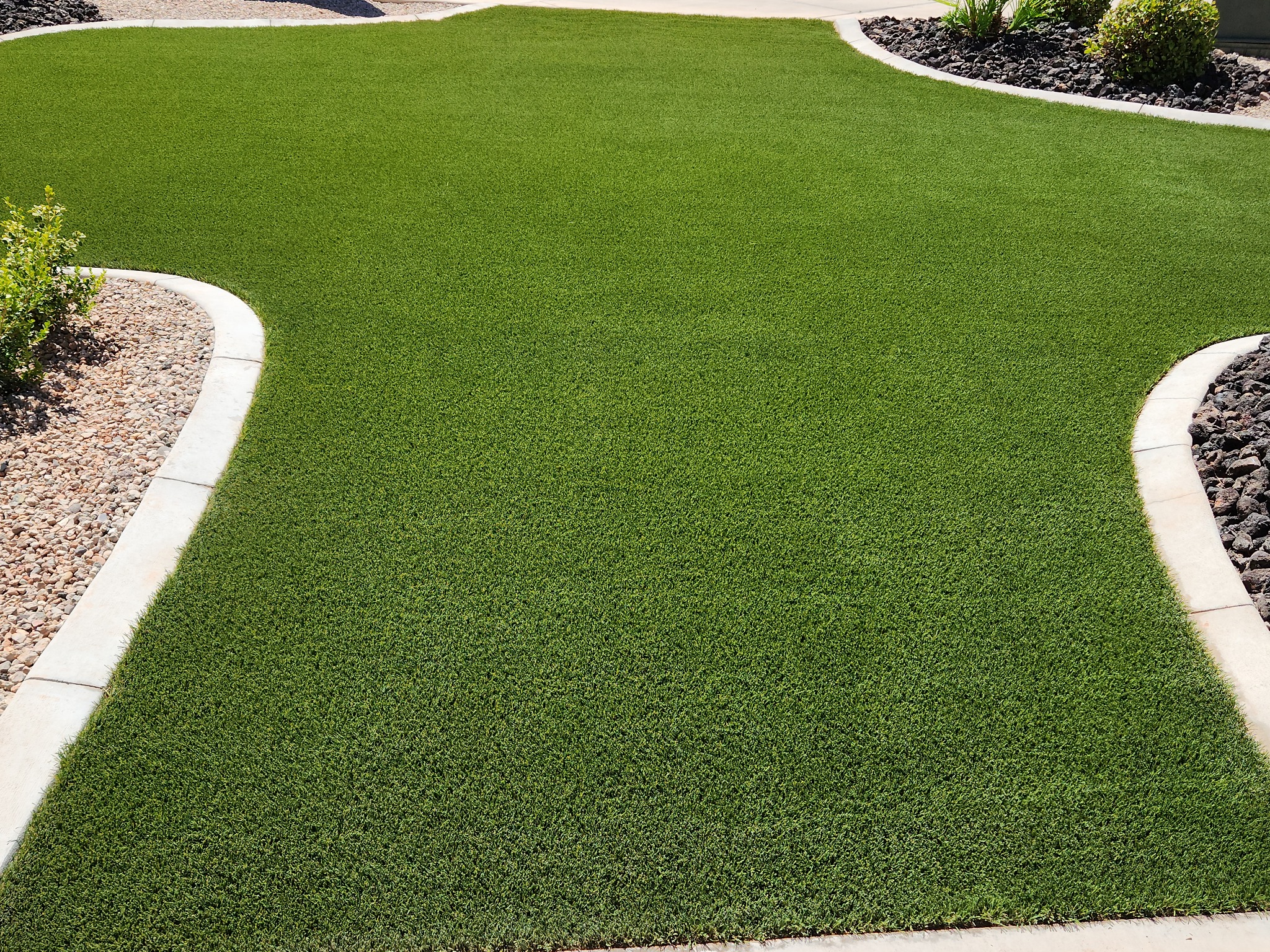 Artificial turf after ClearTurf Care mineral-scale treatment, deep cleaning and restoration.