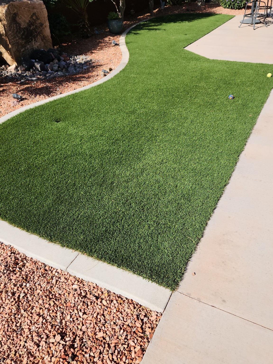 Before ClearTurf Refresh: artificial turf with landscape debris in Ivins, Utah