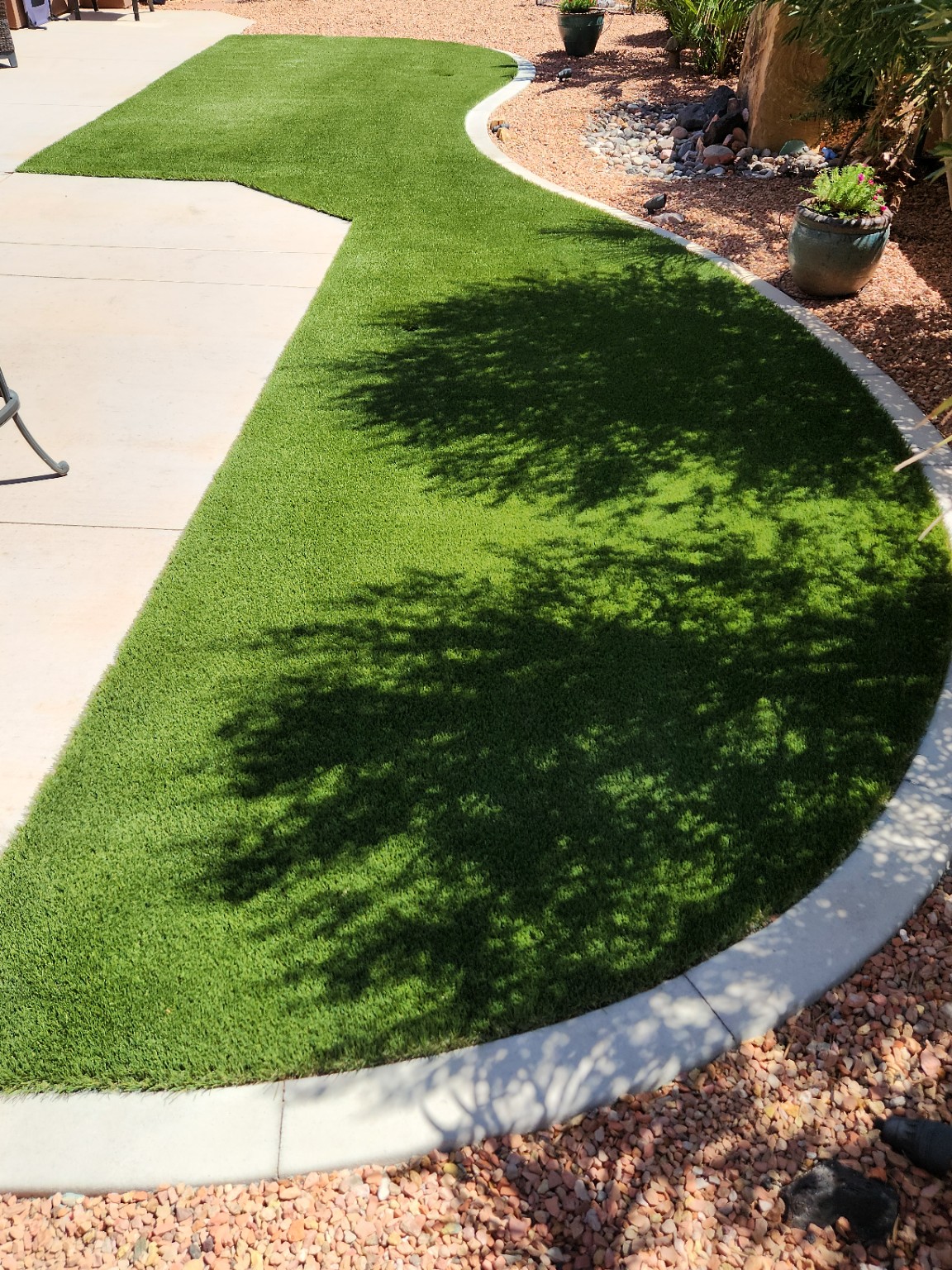 Curved artificial turf area after ClearTurf Refresh in Ivins, Utah
