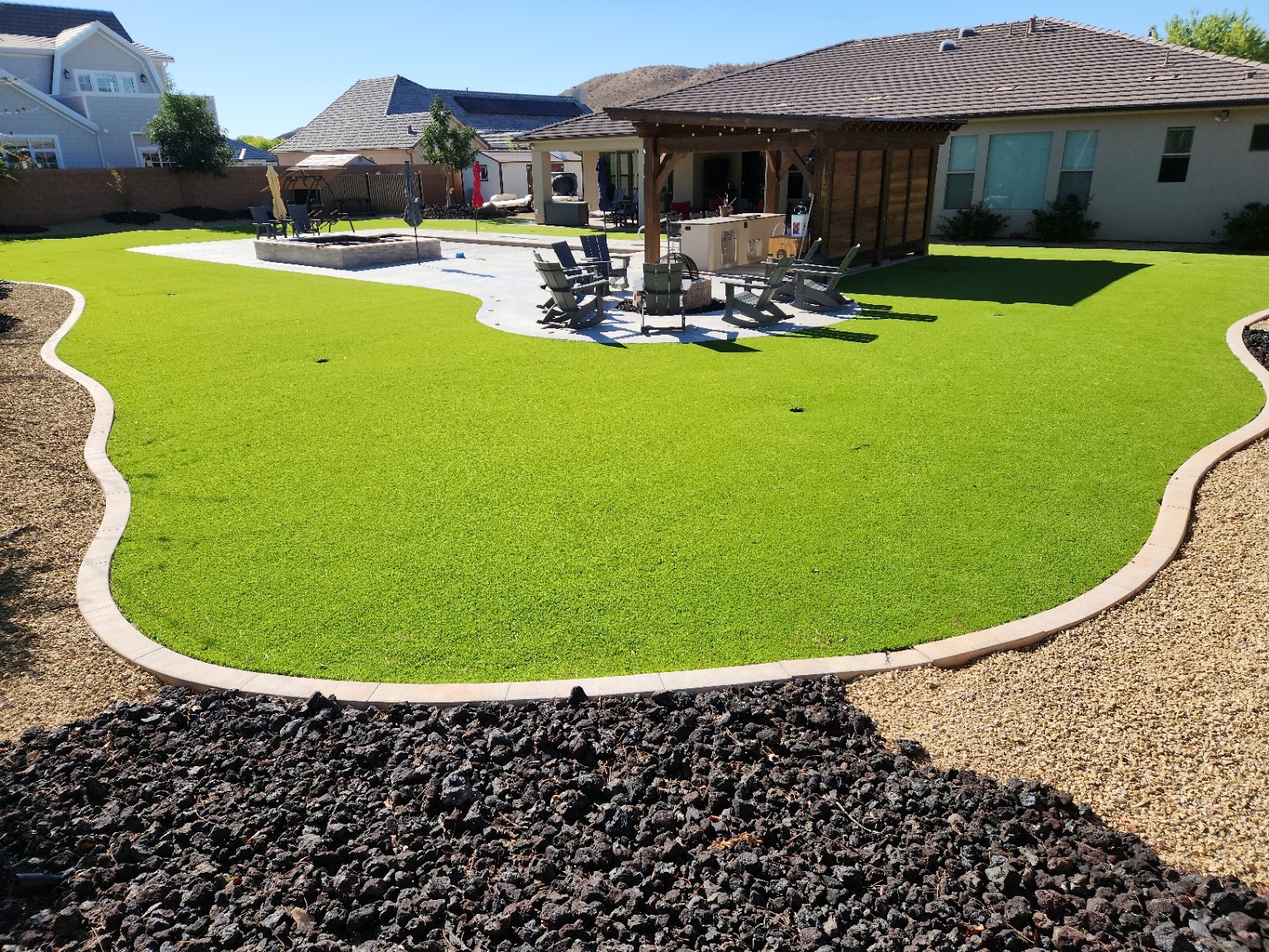 Large Southern Utah artificial turf yard before infill replenishment and reblooming
